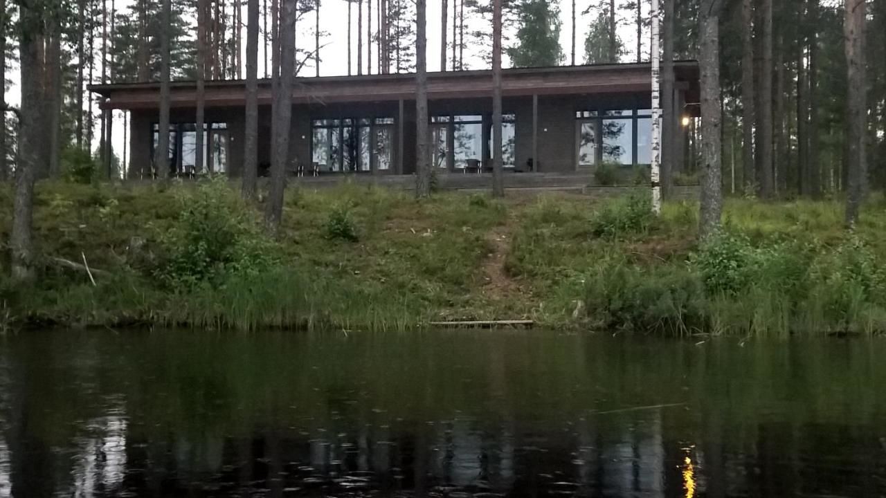 Дома для отпуска Kuoreksenniemi Villas & Lakehouse Пуумала