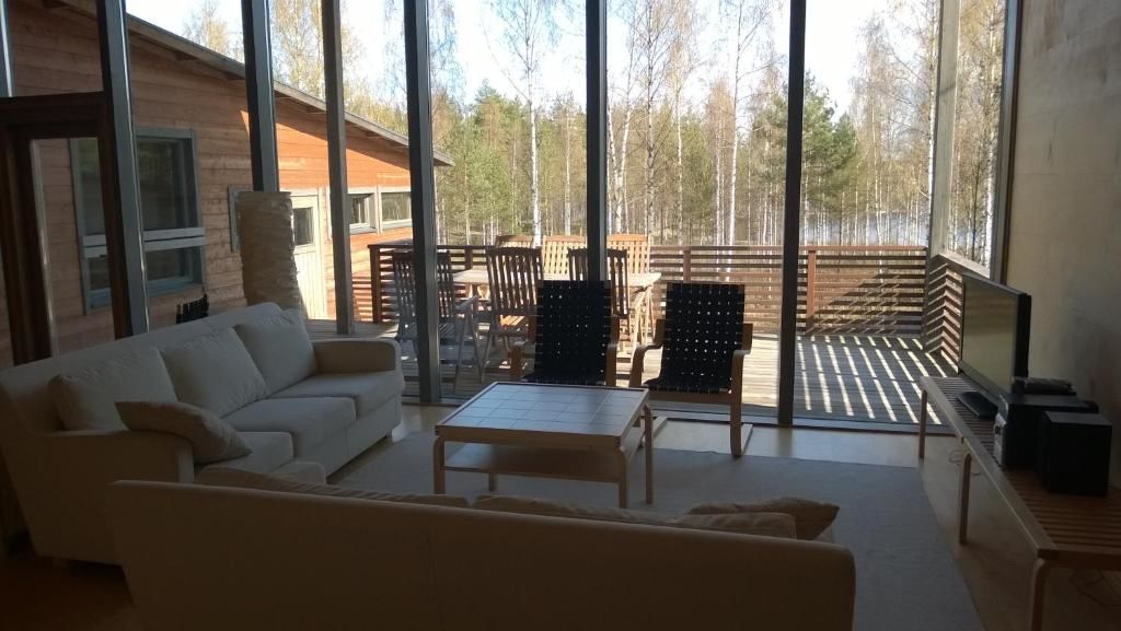 Дома для отпуска Kuoreksenniemi Villas & Lakehouse Пуумала
